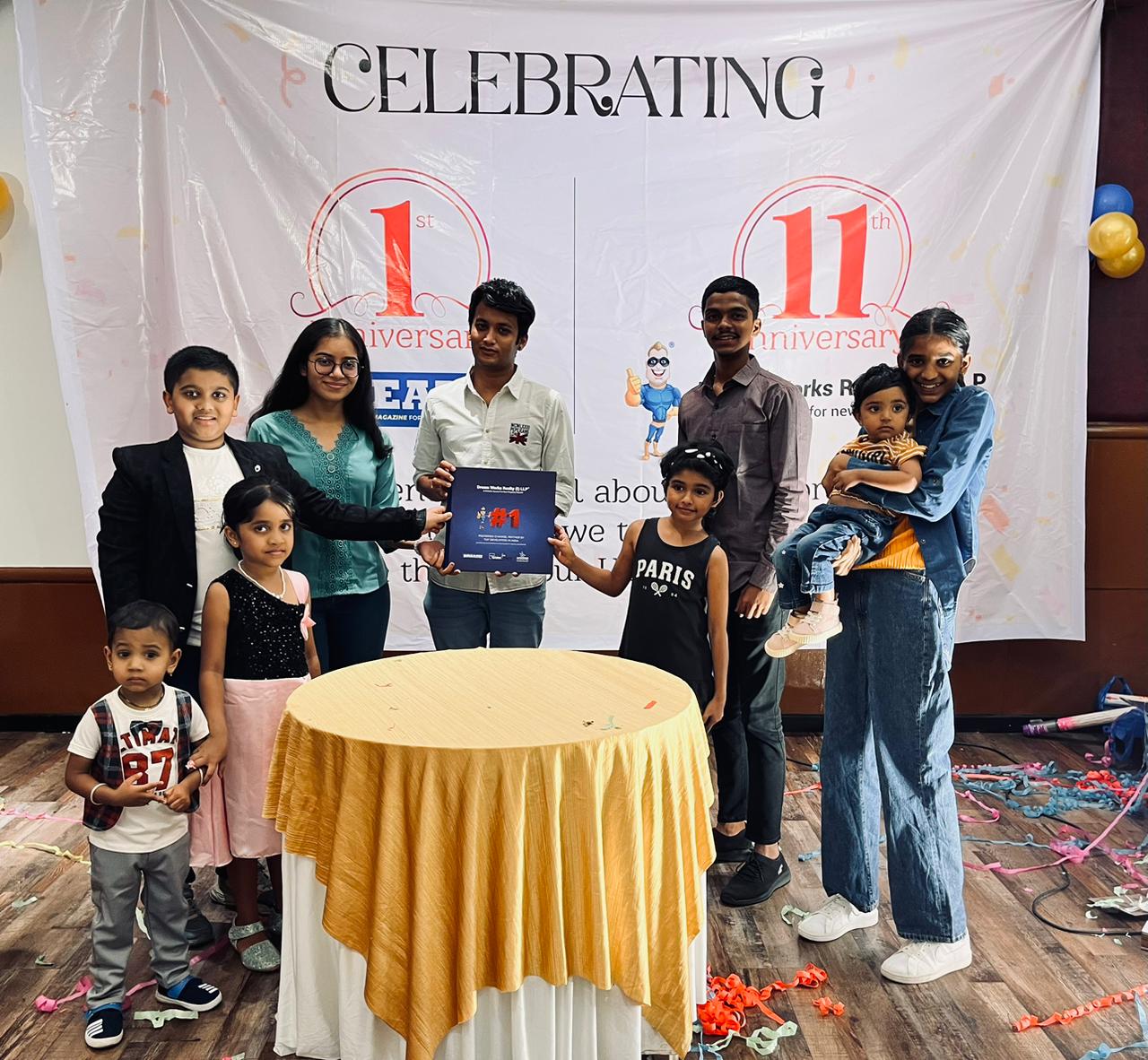 Pune: Dream Works Realty Celebrates 11th Anniversary with Bollywood-Themed Coffee Table Book and Unveiling of Brochure by Staff's Family Members