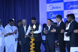 Chief-Minister-of-Maharashtra-Shri-Devendra-Fadnavis-lighting-lamp-on-the-ocassion-of-the-Midea-Group-laying-foundation-stone-for-Technology-Park-in-Pune-Maharashtra.JPG