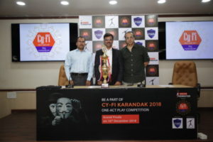 L to R Mr.Sachin Pandkar,SP Maharashtra Cyber,Mr.Kailash Katkar,MD and CEO Qucik Heal Technologies,,Prasad Purandare,President Theatre Academey unveiling the trophy of 'Cy-Fi Karandak 2018