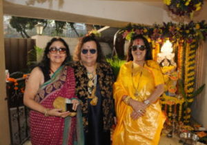 4. Leena chandawarkar with Bappi Lahiri and Reema Lahiri during Saraswati Puja KML_1824