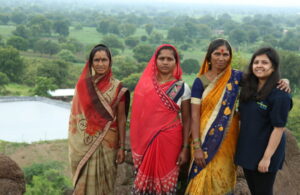 Ms. Maithili Appalwar, CEO, Avana with the wives of farmers at the Avana site in Aurangabad, Maharashtra