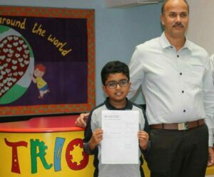 Aarav Nallur with his Mathematics student and parent