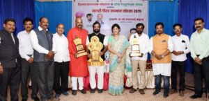 Vanadna Chavan felicitating Ram Bangad and others