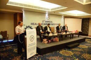 Health Minister Vishwajit Rane addresses audiences at GIM's healthcare conference as the dignitaries look on