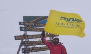 Shrikant Jadhav successfully hoisting Finolex Pipes and Mukul Madhav Foundation flag at Mt. Kilimanjaro on Republic day 2020