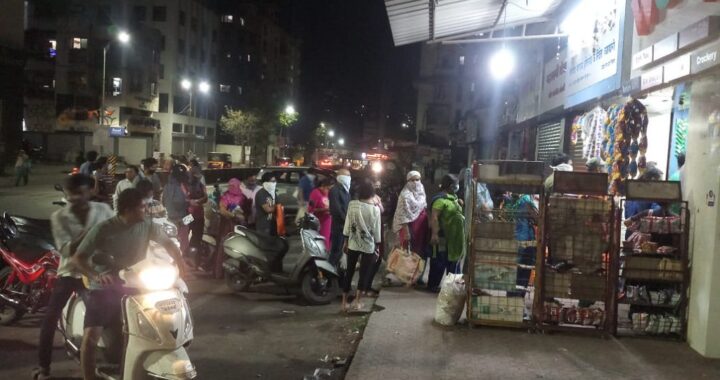 People crowd kirana shop