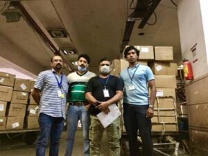 Image of staff handling medical cargo related to Kerala