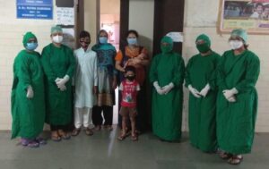 YCM hospital doctors and woman with her kids