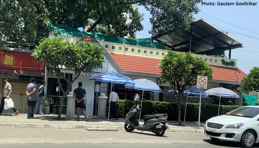 Umbrella put up outside Vaishali on FC Road to save customers from sun.