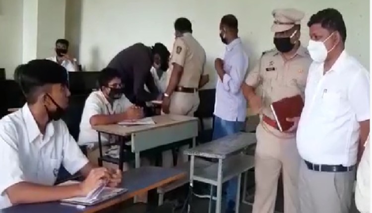 Students appear for exam at a college in Talegaon during lockdown