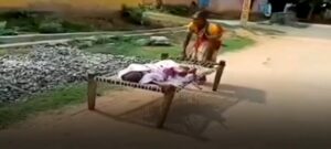 woman drags mother on cot to bank for pension money