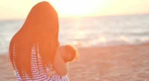woman-breastfeeding-on-beach_edit-1024x838