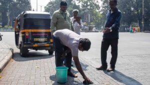 Spittng on Road In Pune