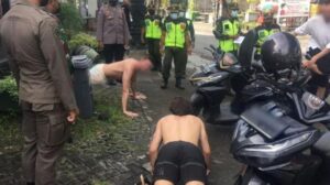 Foreign tourists forced to do push-ups as punishment for not wearing face masks