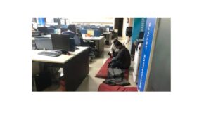 customer sits in bank branch after deduction from account
