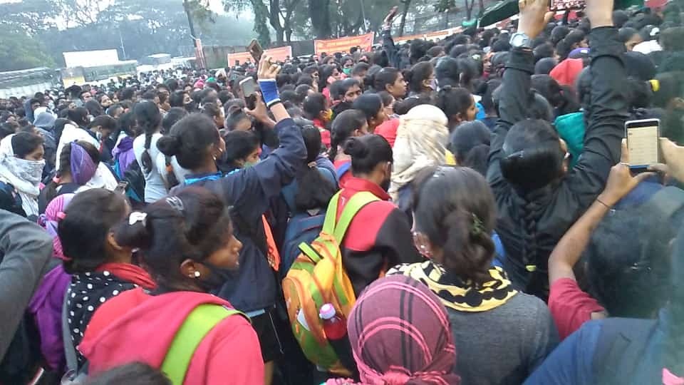 women outside army recruitment rally in Pune