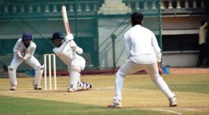 Sachin Dhas of Combined District playing attacking shot against PYC Hindu Gymkhana Bowler at PYC Hinud Gymkhana Ground