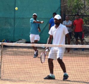 Action photo of Ravindra Pande(Skyblue) and Yogesh Aher(White) of Solaris RPTA ....