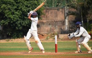 Om Bhabad of Varroc playing attacking shot against Shree Siddhivinayak Cricket Club bowler at Vision Cricket Ground