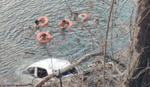 car in river Panshet Pune