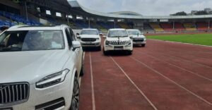 Vehicles on athletic track at Balewadi stadium Pune