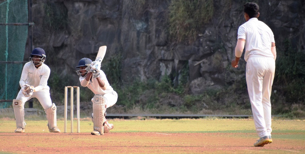 Smit Patil of United Sports Club playing attacking shot against Brilliants Sports Academy bowler at Yewalewadi Brillirants Sports Academy ground..