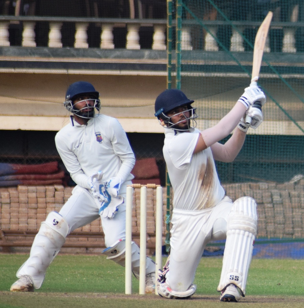 Ranjit Nikam of MCA West Zone playing attacking shot against MCA Central Zone bowler at PYC Ground.