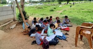Children study under tree In Pune