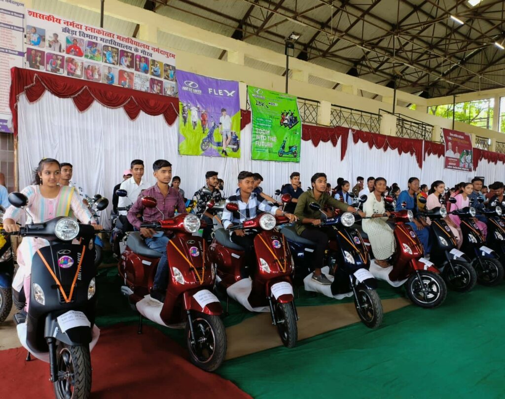 Government School Toppers from Hoshangabad felicitated by MP Government with Kinetic Green Electric Scooters