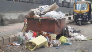 VIP Airport Road Sanjay Park slums garbage in Viman Nagar
