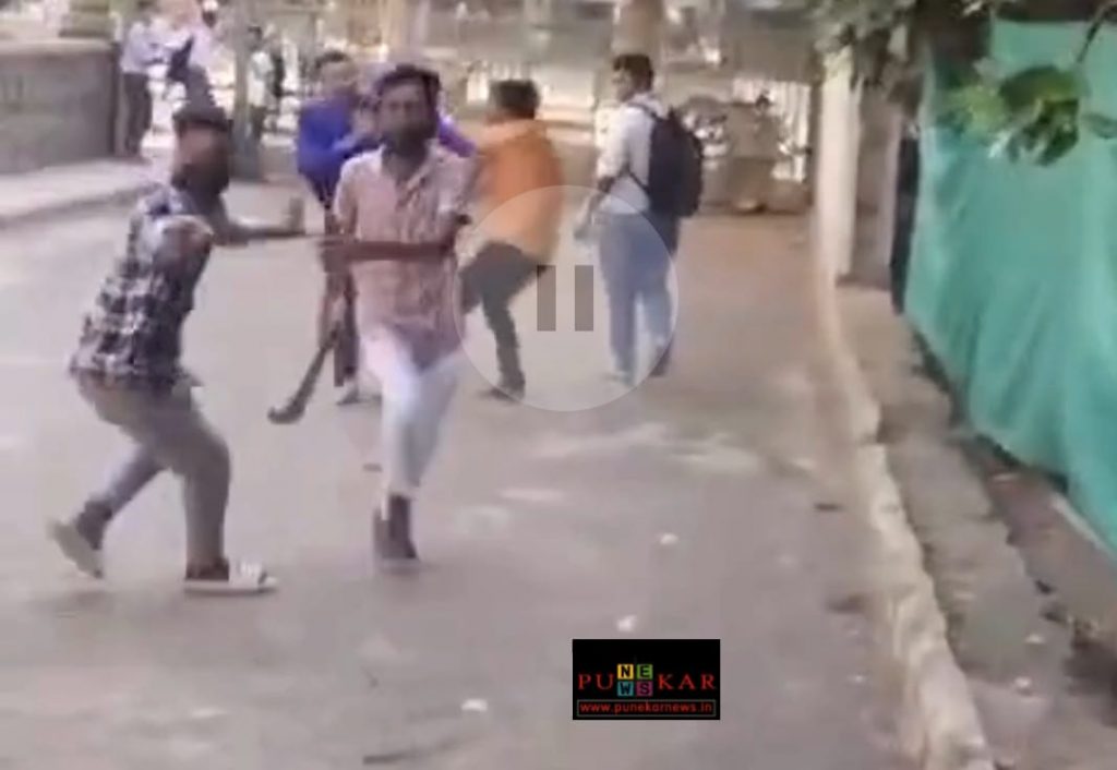 Student Groups Wielding Sticks