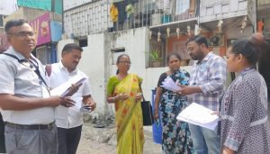 Voter slip distribution in Shivajinagar