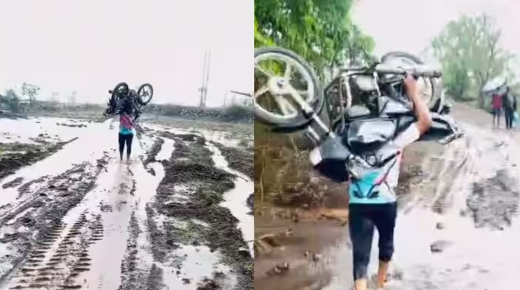 Satara youths lift bike on shoulders