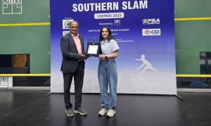 Rudra Singh receives the Girl’s Under-19 winner’s plaque from the chief guest in Chennai on Saturday