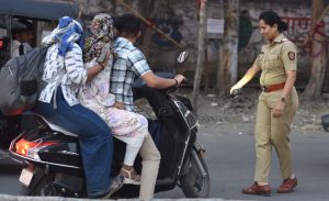 triple seat riding in Pune