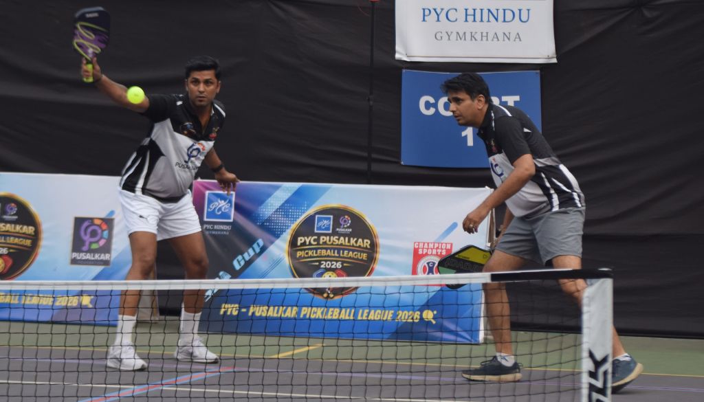 Action photo of Siddharth Badamikar and Amar Shroff of BM Smashers