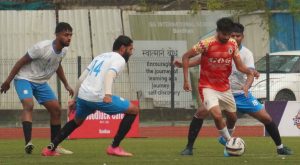 Action photo of GOG FC(Orange Shirt) and AIFYA(White Shirt)