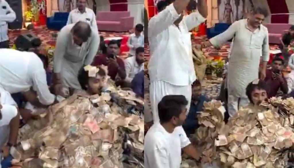 Viral Gujarat Video Shows Folk Singer Singing Calmly Under Mountain of Cash