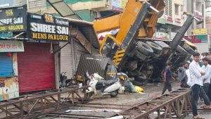 PMRDA Crane Falls on Shop in Hinjawadi During Hoarding Removal Operation