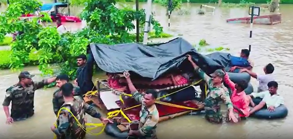Army Soldier Delivers Baby Amid Floodwaters